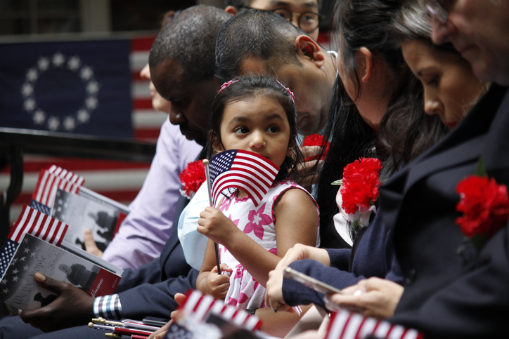 daughter of immigrant at US oath of ceremony
