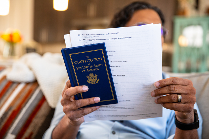 person reviewing the US Constitution